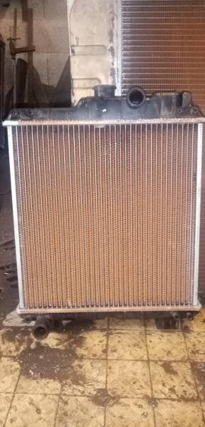changement faisceau de radiateur de tracteur