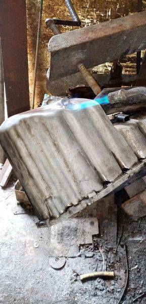 réparation carter huile moteur